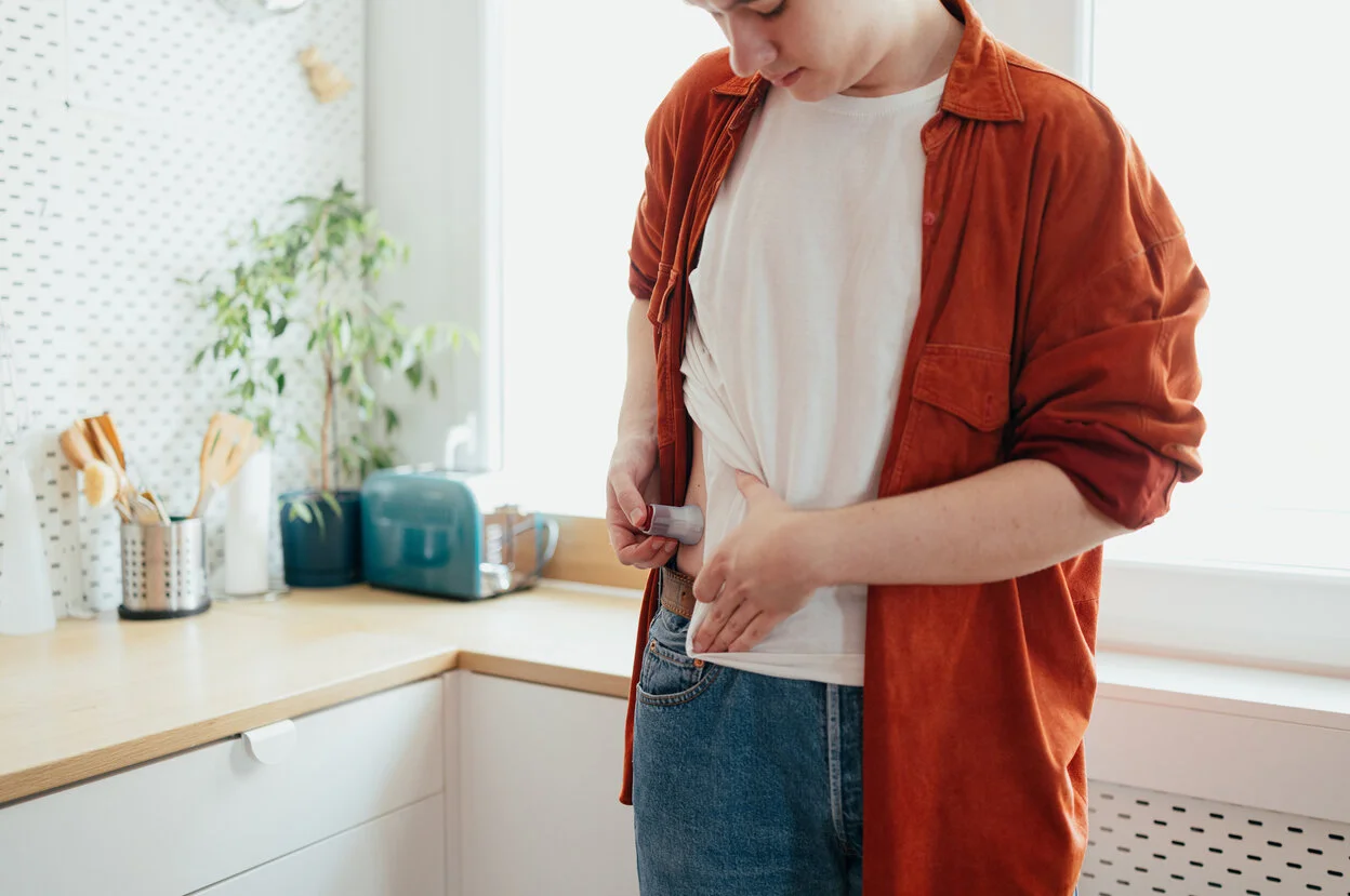 a man wearing a red shirt