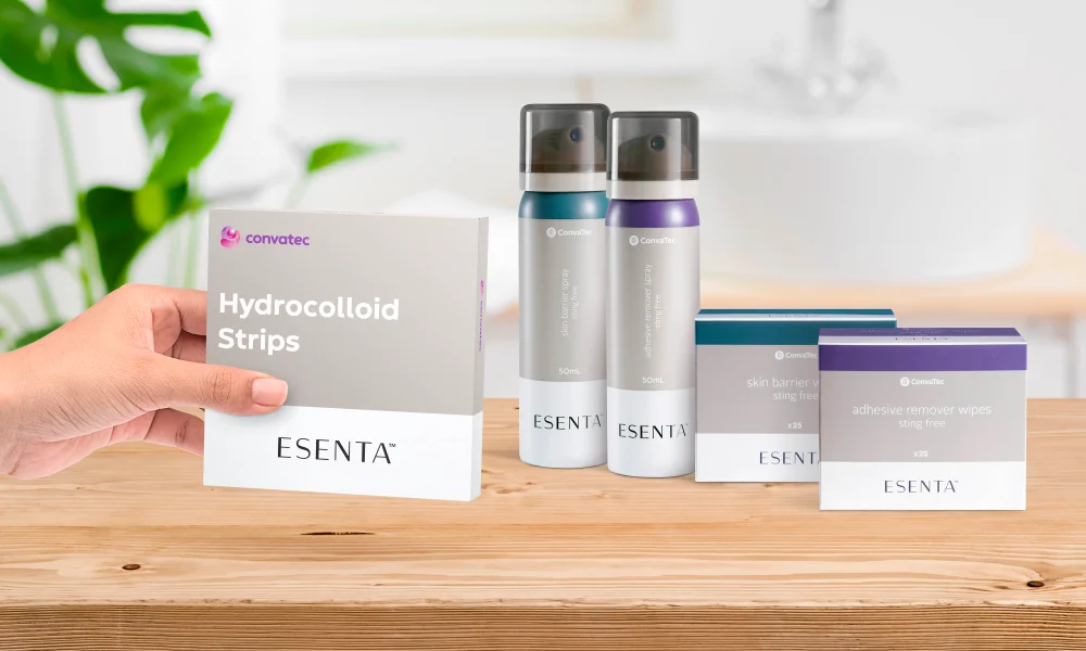 a hand holding a product box