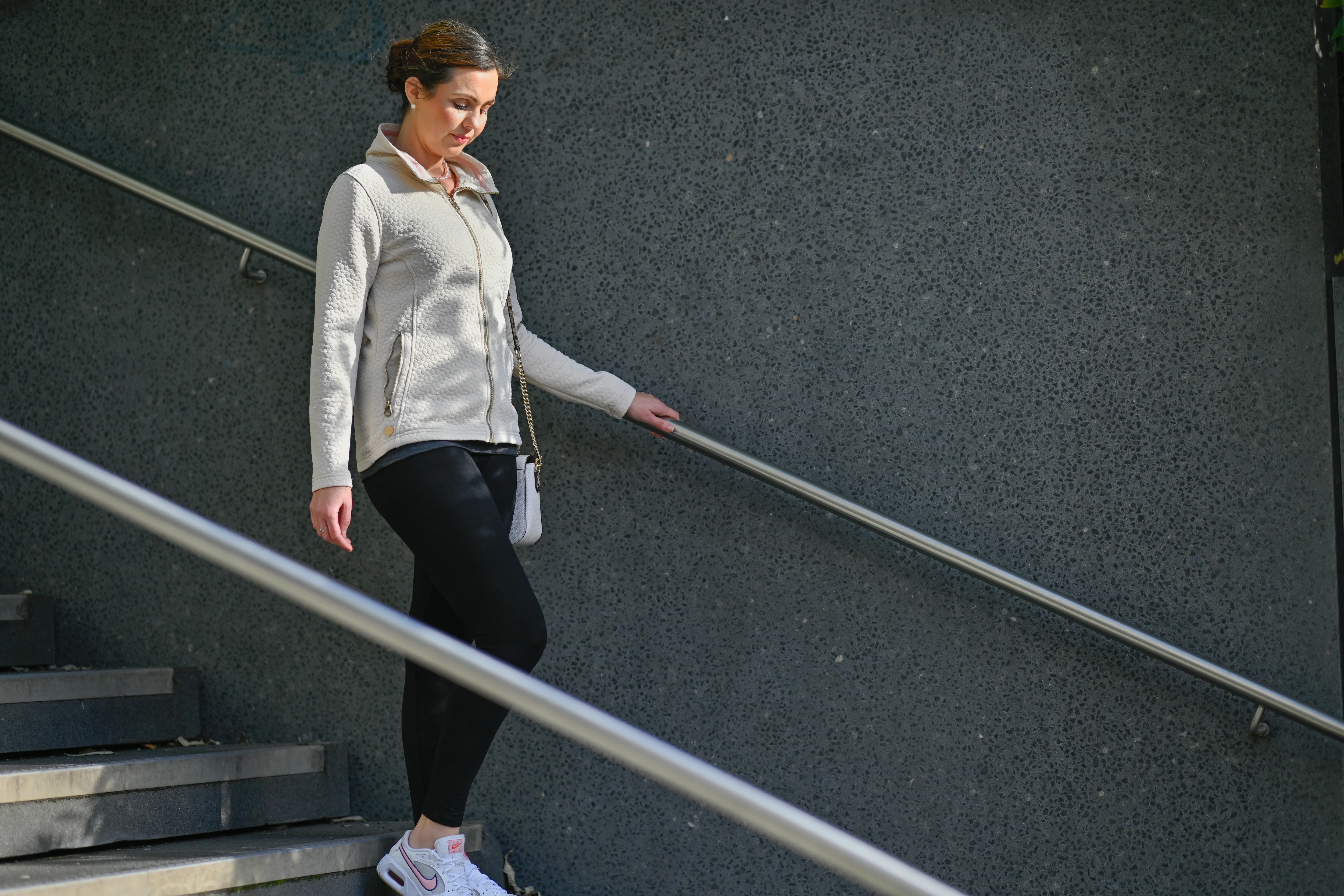a person walking up a flight of stairs
