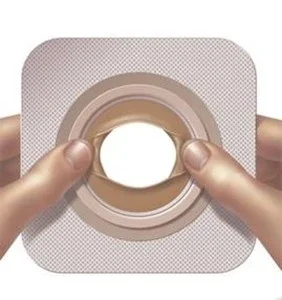 a hand holding a cup